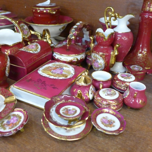 686 - A collection of Limoges porcelain, approximately 60 pieces