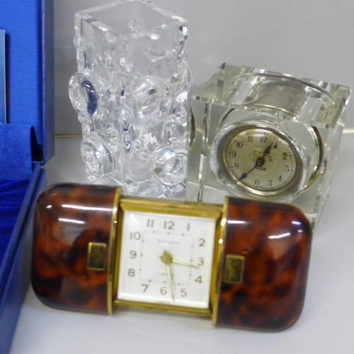 687 - A collection of vintage 20th Century travel clocks including glass and a Pukeberg paperweight; a Eur... 