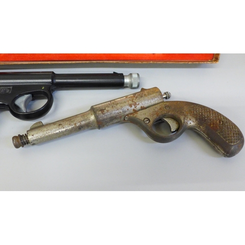 693 - Two pellet guns and a pair of Mustang boxed cap guns