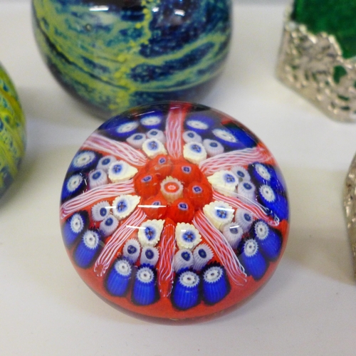 695 - Three Mdina glass paperweights, a Strathern pocket watch and two coloured glass scent bottles