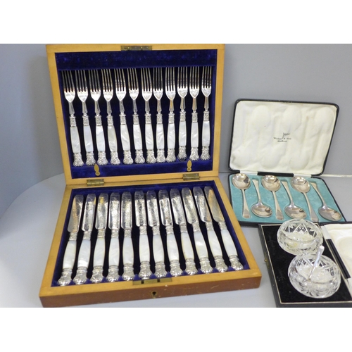 700 - A cased set of 24 silver plate and mother of pearl fish knives and forks, a cased set of six Walker ... 