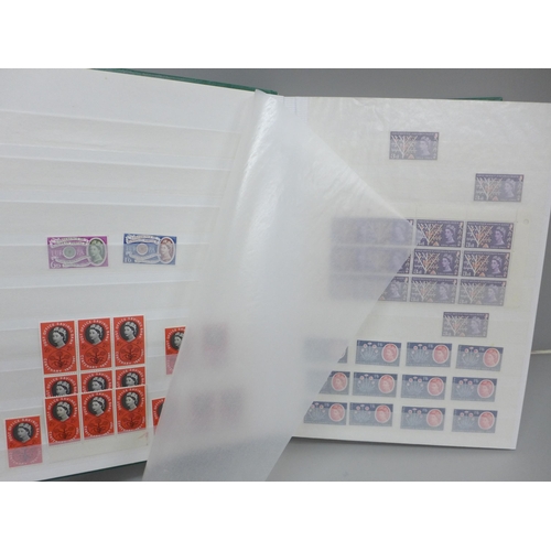 708 - Stamps; GB pre-decimal Queen Elizabeth II mint stamps, duplicated stock in 64 page stock book