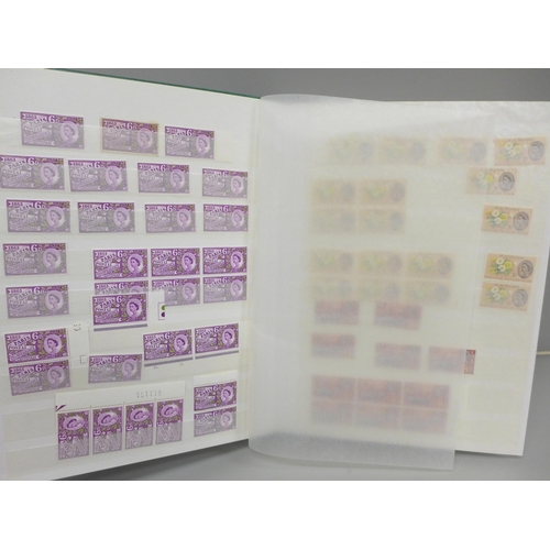 708 - Stamps; GB pre-decimal Queen Elizabeth II mint stamps, duplicated stock in 64 page stock book