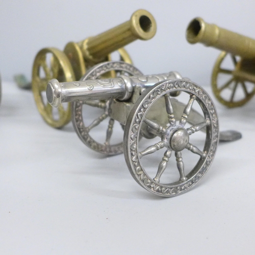 722 - Four model cannons, two plate and two brass