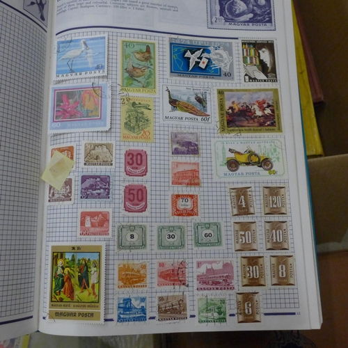 734 - A collection of stamp albums, some albums a/f, damp penetration