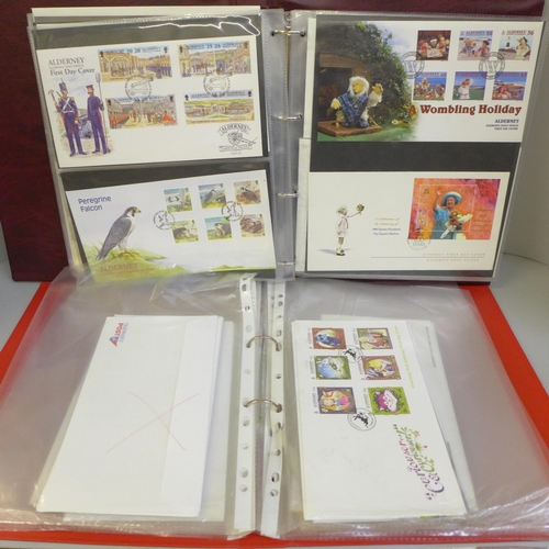 756 - Two albums of first day cover stamps, mainly Alderney