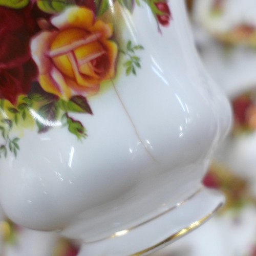 793 - A Royal Albert Old Country Roses tea and coffee set, telephone, cake stand, etc., two cups a/f  **PL... 