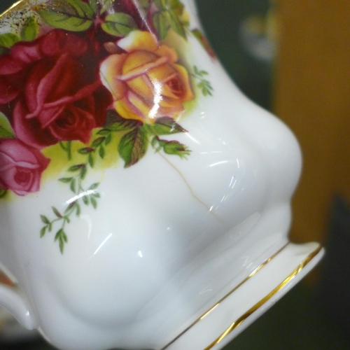 793 - A Royal Albert Old Country Roses tea and coffee set, telephone, cake stand, etc., two cups a/f  **PL... 