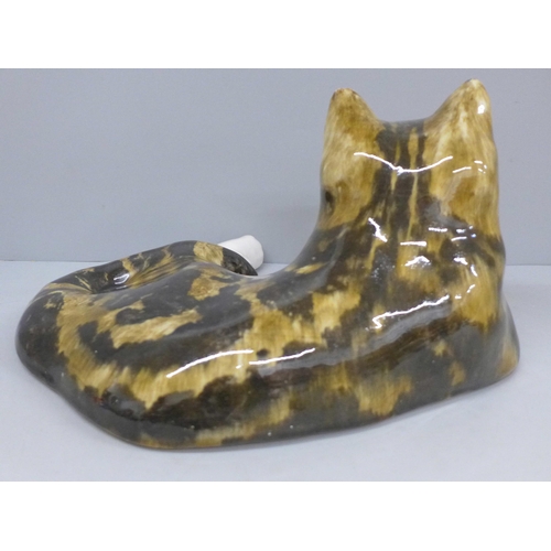 795 - A large Winstanley Tabby cat, signed to base, 35cm