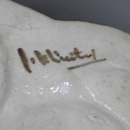 795 - A large Winstanley Tabby cat, signed to base, 35cm