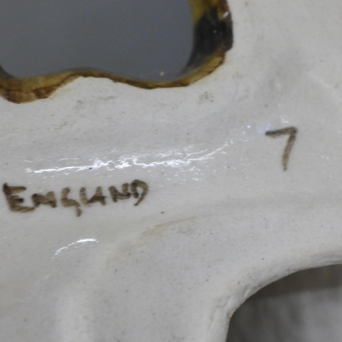 795 - A large Winstanley Tabby cat, signed to base, 35cm