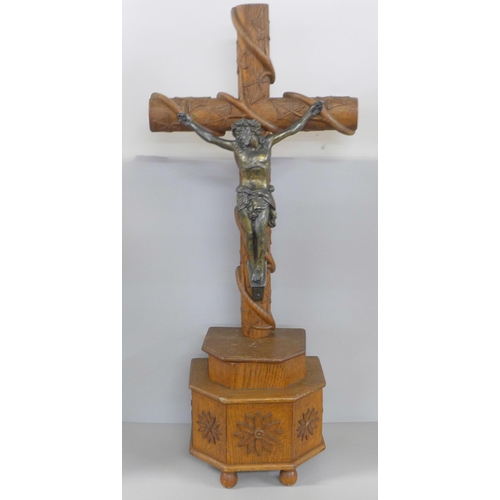 812 - A large oak and gilt spelter altar crucifix, 66cm