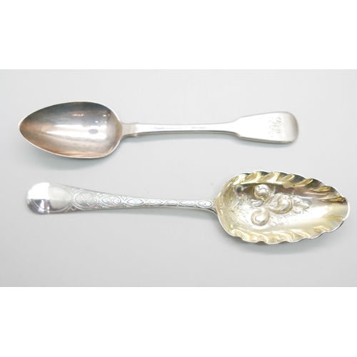 887 - A George II silver berry spoon by Elizabeth Oldfield and an early 19th Century silver spoon by Sarah... 