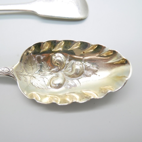 887 - A George II silver berry spoon by Elizabeth Oldfield and an early 19th Century silver spoon by Sarah... 