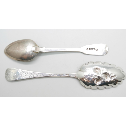 887 - A George II silver berry spoon by Elizabeth Oldfield and an early 19th Century silver spoon by Sarah... 