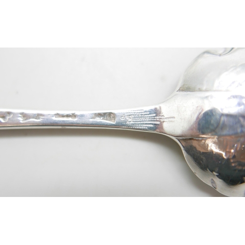 887 - A George II silver berry spoon by Elizabeth Oldfield and an early 19th Century silver spoon by Sarah... 