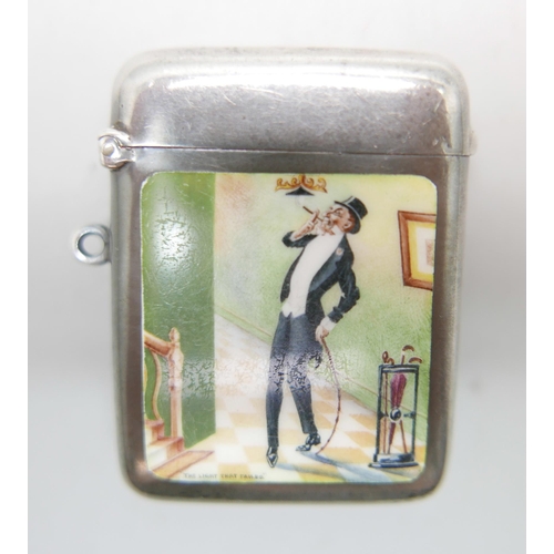 894 - An Edward VII enamelled silver vesta case depicting a well dressed gentleman, 'The Light That Failed... 