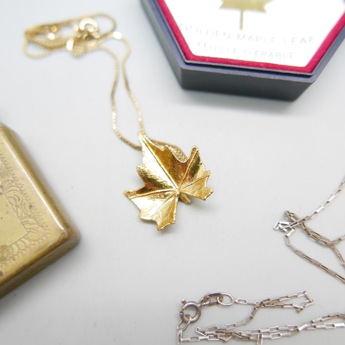 899 - A rolled gold Yard-O-Led pencil, a silver gilt chain with 'Golden Maple Leaf' pendant, a Zippo light... 