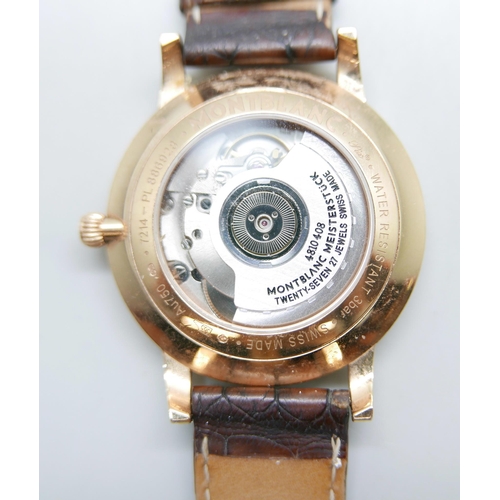 900 - An 18ct gold Mont Blanc automatic wristwatch, model 107076, 7214-PL886928, with box and service guid... 