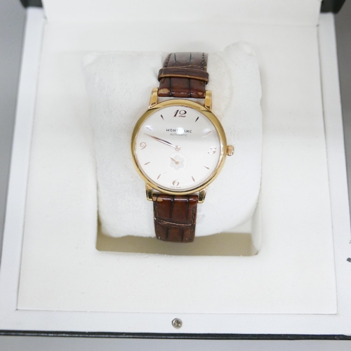 900 - An 18ct gold Mont Blanc automatic wristwatch, model 107076, 7214-PL886928, with box and service guid... 