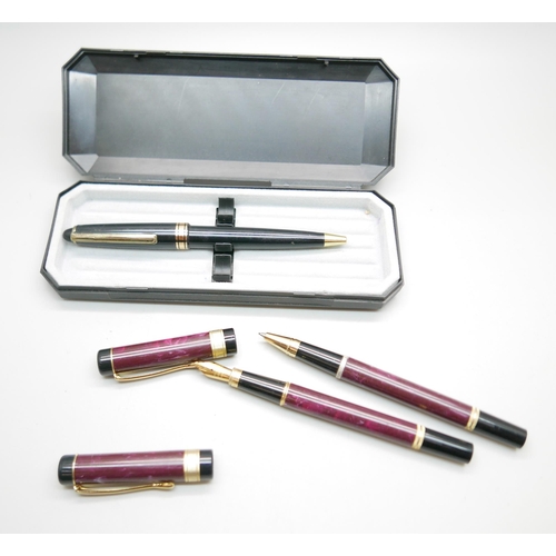 911 - A cased set of three German pens