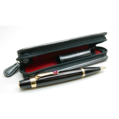 912 - A cased Mont Blanc Boheme ballpoint pen set with a ruby, GD1071387