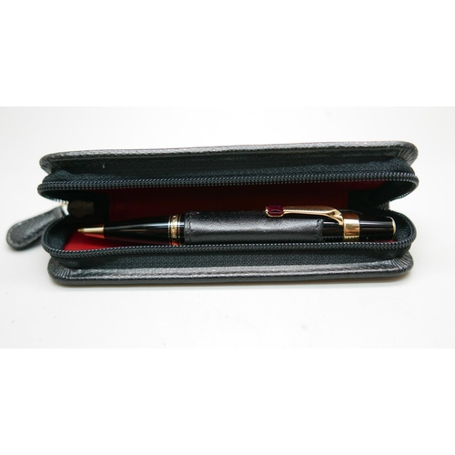 912 - A cased Mont Blanc Boheme ballpoint pen set with a ruby, GD1071387