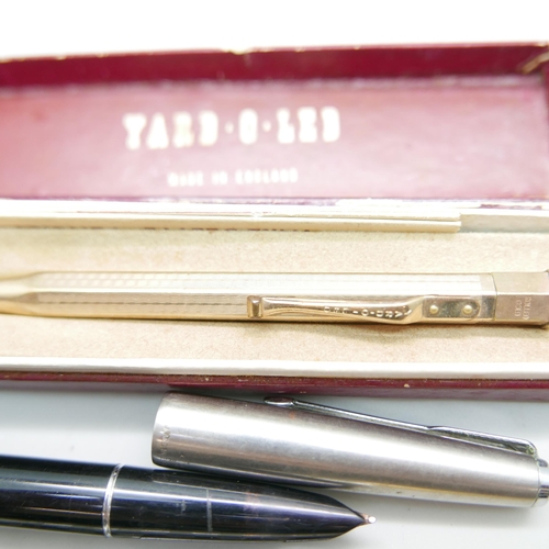 919 - A Yard-O-Led rolled gold pencil in original box and three Parker pens