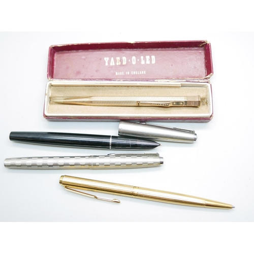 919 - A Yard-O-Led rolled gold pencil in original box and three Parker pens