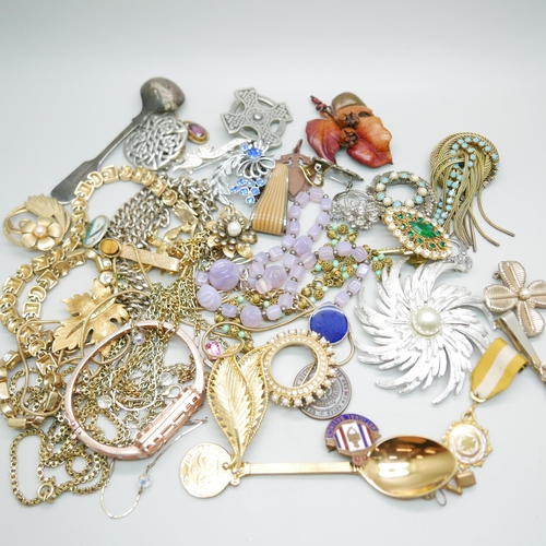 940 - A collection of costume jewellery including three items of Sarah Coventry, brooch requires repair