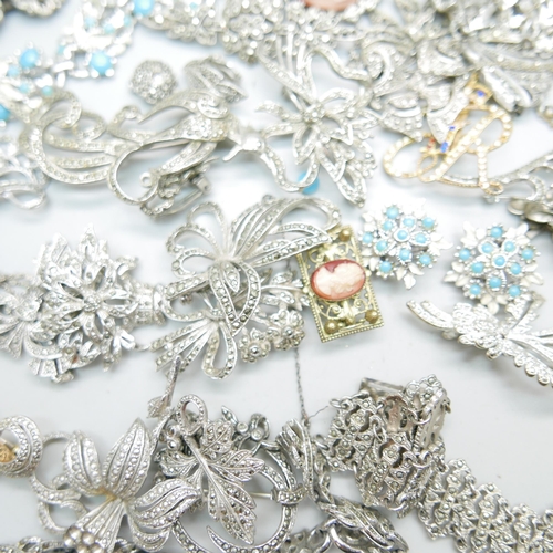 964 - A collection of paste set jewellery, a silver and marcasite brooch, an Art Nouveau style lady in the... 