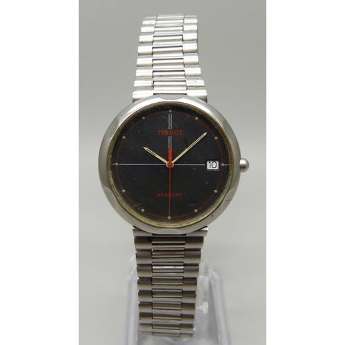 971 - A vintage Tissot Seastar wristwatch with black face and red second sweep hand, with date and origina... 