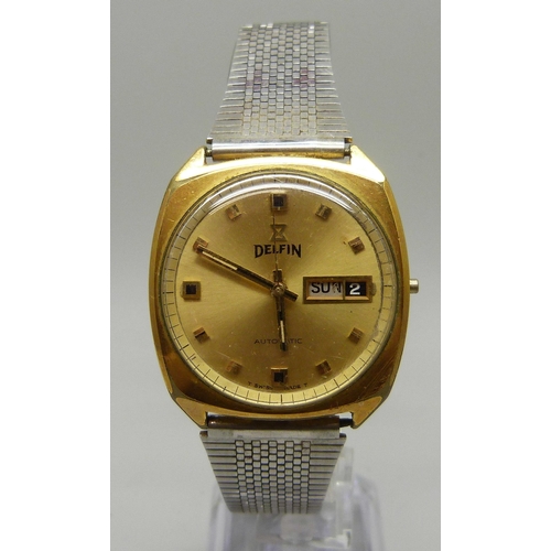 973 - A gentleman's Delfin automatic wristwatch with day date and sweep second hand