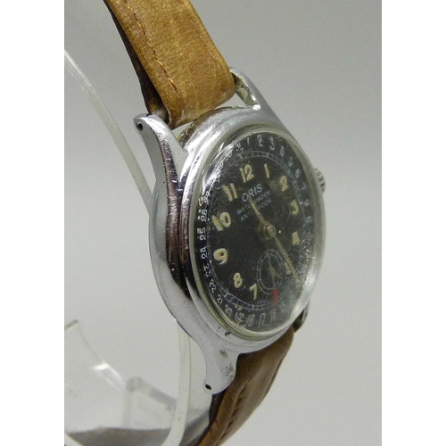 975 - A gentleman's black faced Oris anti-shock stainless steel wristwatch, circa 1960s, 30mm case