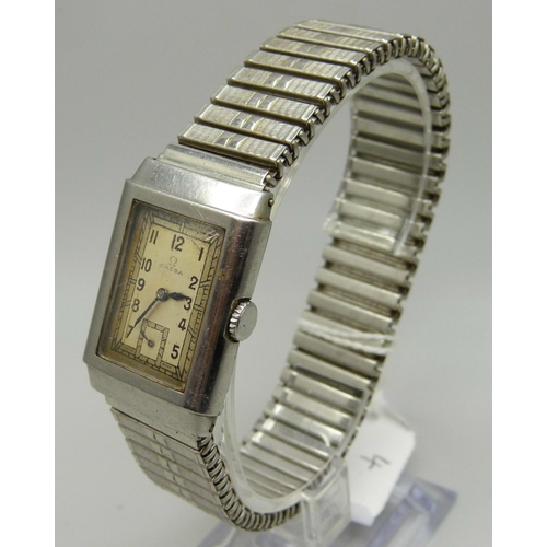 981 - A gentleman's 1930s stainless steel Omega tank wristwatch, 22mm case