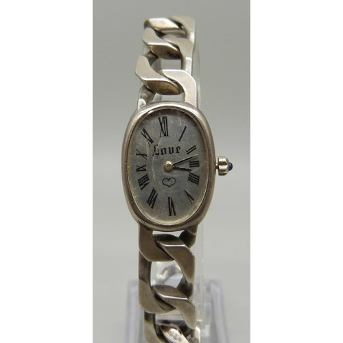 988 - A lady's silver wristwatch, the face marked Love, 67g