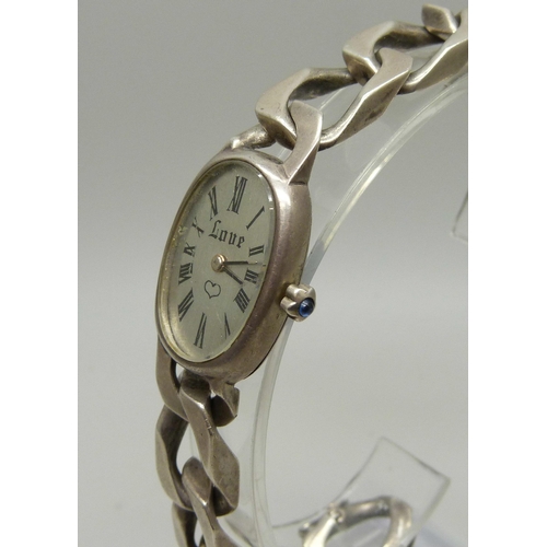 988 - A lady's silver wristwatch, the face marked Love, 67g