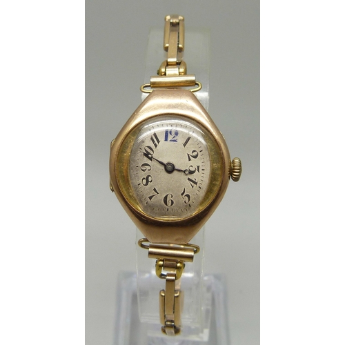 992 - An Art Deco 9ct gold wristwatch on a German made 1/20th 14ct gold bracelet strap