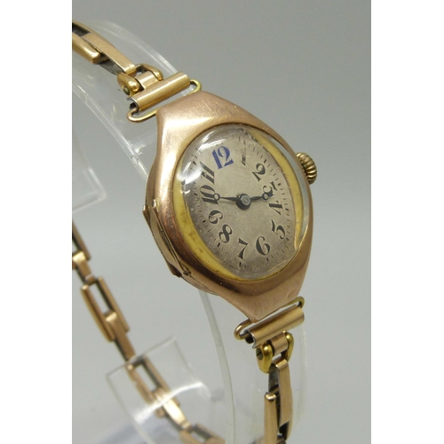 992 - An Art Deco 9ct gold wristwatch on a German made 1/20th 14ct gold bracelet strap