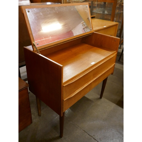 62 - A Swedish teak dressing chest