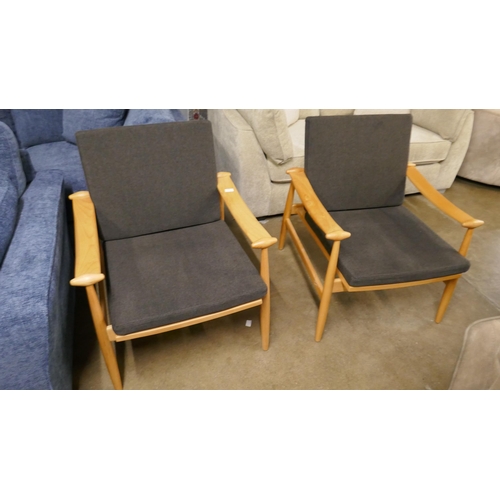 1356 - A pair of wooden framed lounge chairs