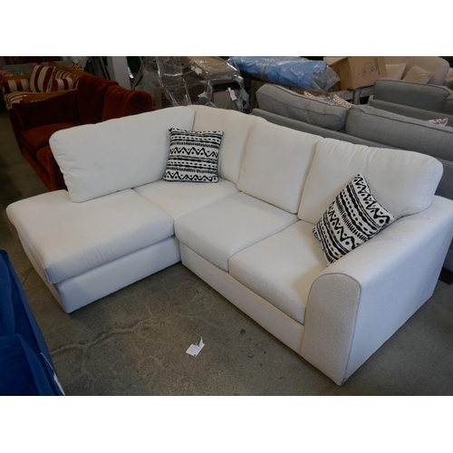 1503 - An off-white upholstered compact corner sofa