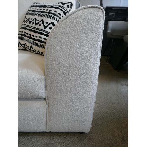 1503 - An off-white upholstered compact corner sofa