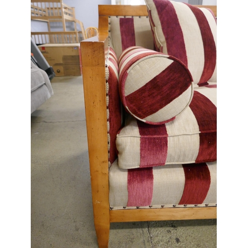 1506 - Artistic Upholstery, burgundy and grey velvet three seater sofa with interior springs and semi expos... 