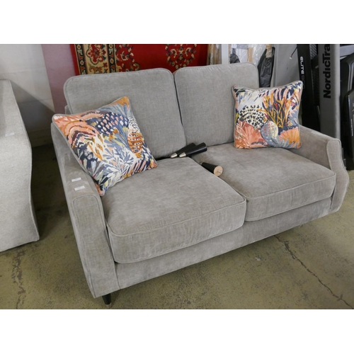 1508 - A grey velvet two seater sofa - missing legs, damaged frame