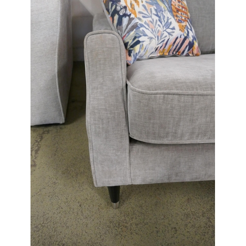 1508 - A grey velvet two seater sofa - missing legs, damaged frame