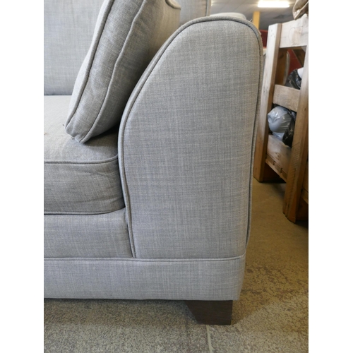 1520 - A grey upholstered three seater and a two seater sofa