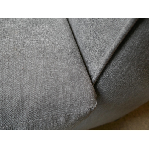 1521 - A grey upholstered three seater sofa