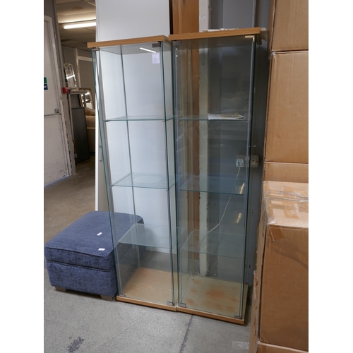 A pair of four tier glazed display cabinets
