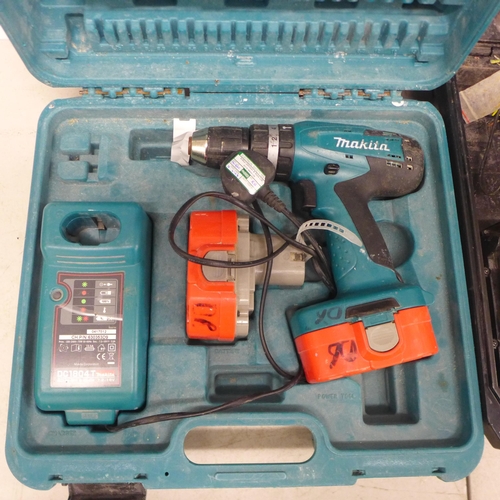 2006 - A Makita 8391D 18v cordless power drill with battery and battery charger and a Dewalt DCH364 36v Li-... 